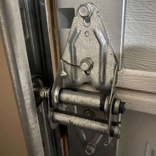 Broken Garage Door Hinges or Rollers